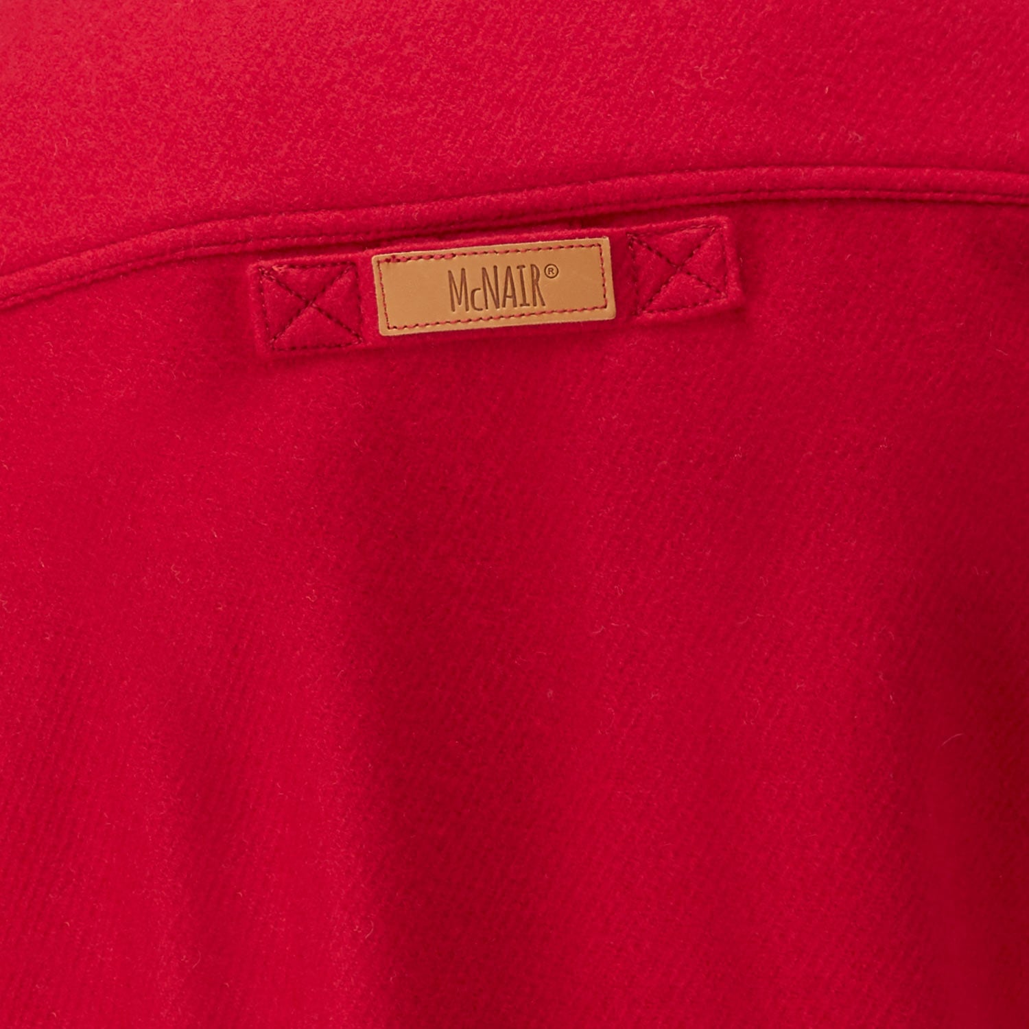 McNair Chilli Red merino Gilet - back label